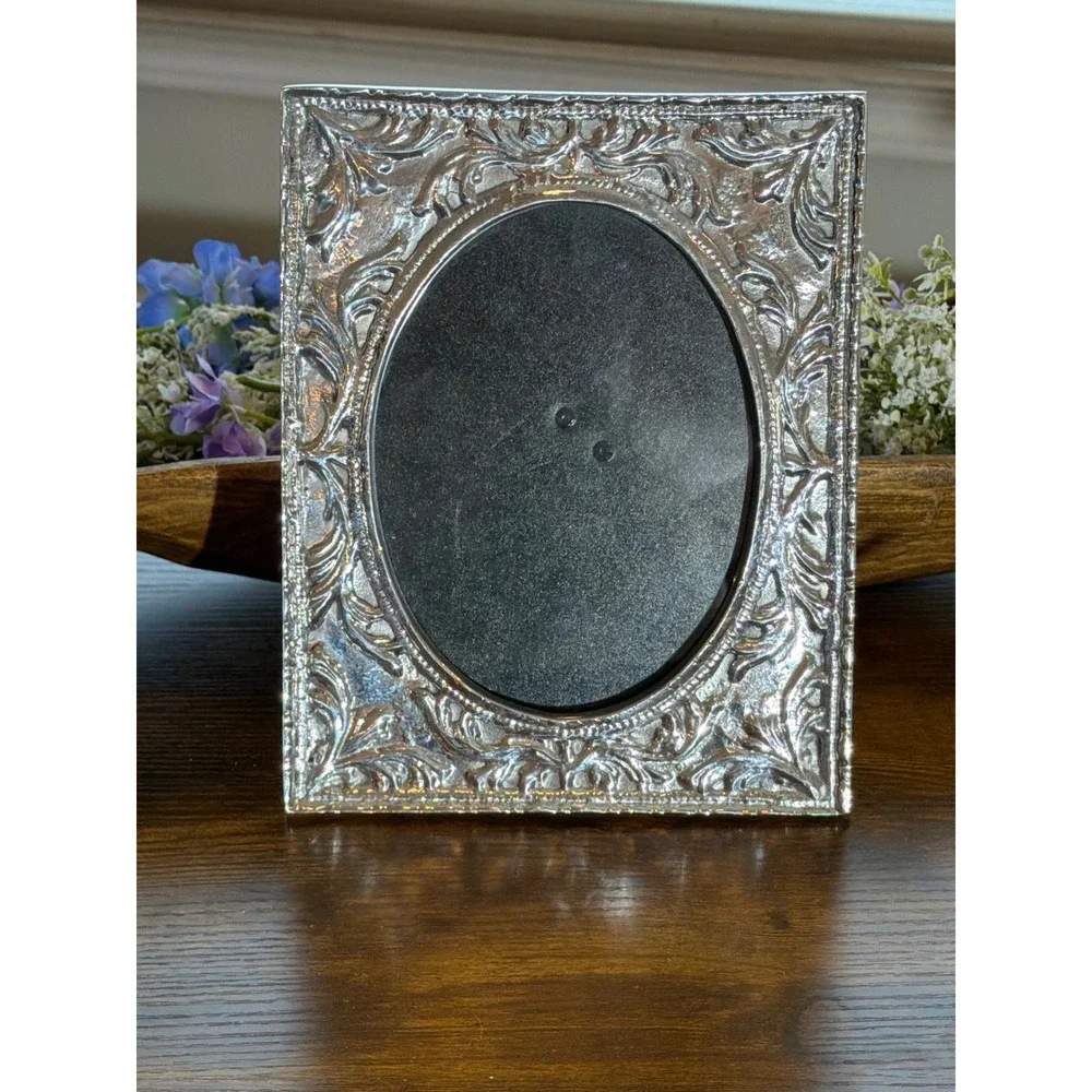 Vintage Ornate Silver Embossed Picture Frame Oval Opening Scrollwork Tabletop
